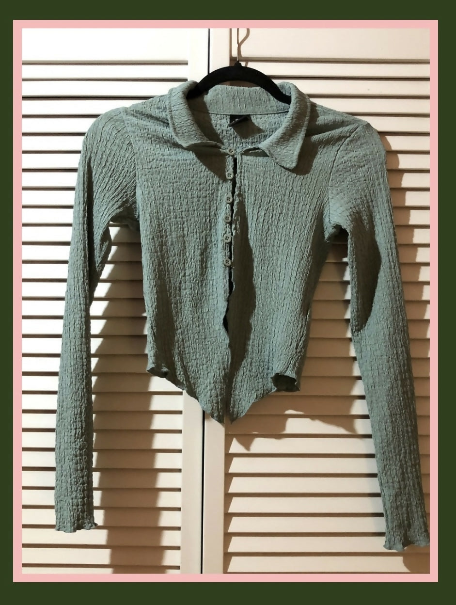 Women’s textured button front top with split hem