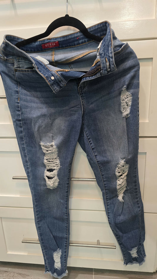 Distressed ankle skinny jeans